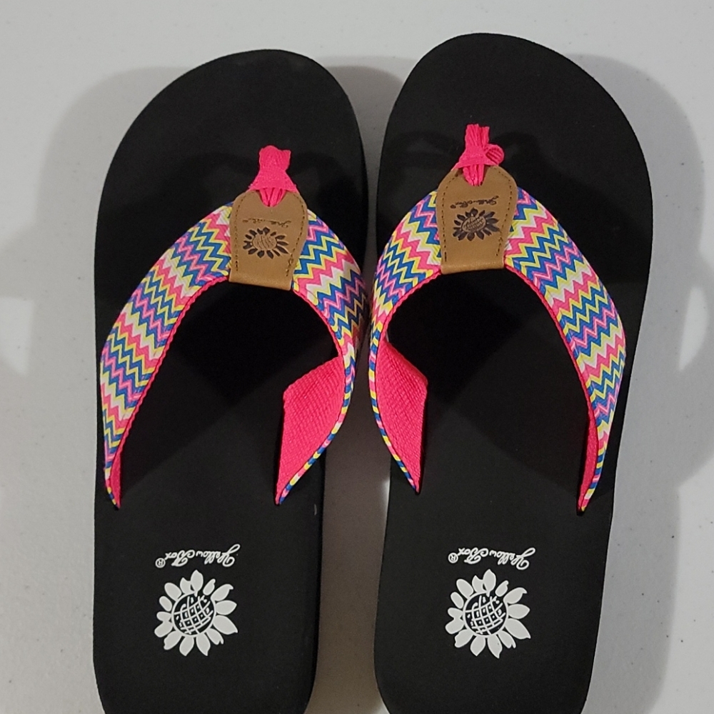 Yellow box flip flops